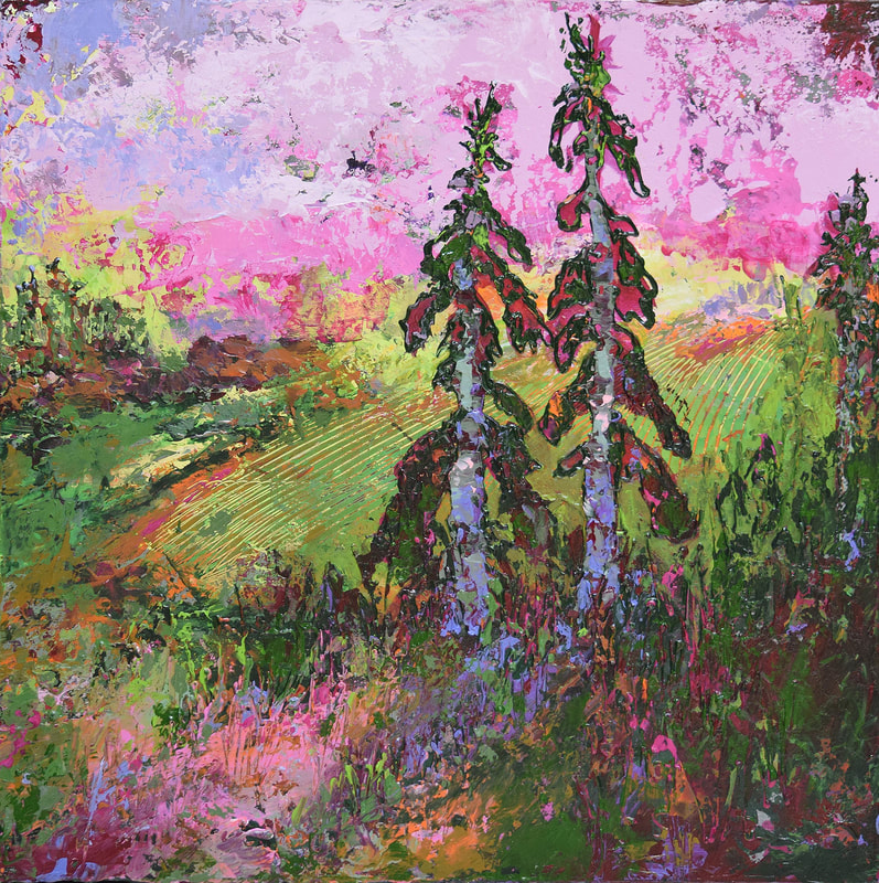 Two pine tree lean towards each other on a hill overlooking plowed fields against a pink hazy sky